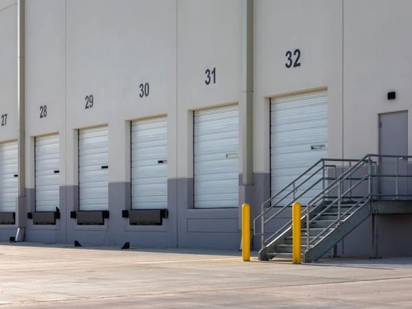 Commercial warehouse exterior with loading dock